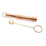 9ct rose gold cigar piercer and cigarette holder
