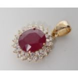 Ruby, diamond and 18ct yellow gold cluster pendant