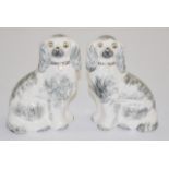 Pair Staffordshire ceramic seated dog figures