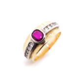 Red gemstone and diamond set 9ct yellow gold ring