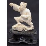 Chinese carved ivory fisherman figure