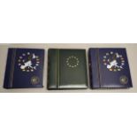 Three European currency coin / banknote albums