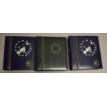 Three European currency coin / banknote albums
