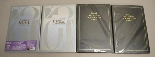 Four Australian annual stamp year books