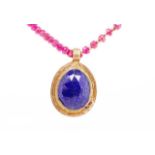 Lapis pendant on a ruby beaded necklace