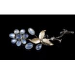 Antique moonstone and silver flower brooch