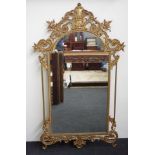 Ornate gilt metal mirror