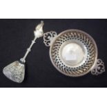 George V sterling silver tea strainer