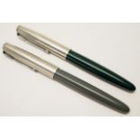 Two similar Parker fountain pens