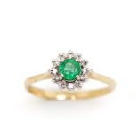 Emerald and diamond set 9ct yellow gold daisy ring