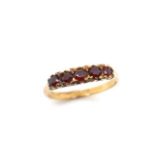 Five stone garnet and 9ct gold ring