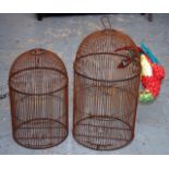 Two similar decorative birdcages