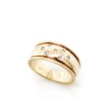 Seven stone diamond and 9ct yellow gold ring
