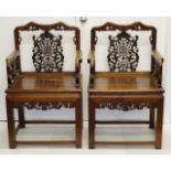 Pair of antique Chinese carved rosewood armchairs