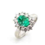 Emerald and diamond set platinum cluster