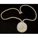 Carved ivory rose form pendant