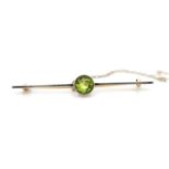 Peridot set silver and gold bar brooch