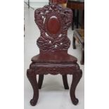 Ornately carved Chinese chair