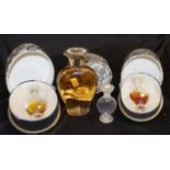 Four Marcel Rochas Femme perfume bottles