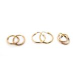 Three pairs of gold hoop earrings