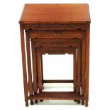 Nest of four rosewood tables