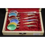 Cased set silver gilt & enamel coffee spoons