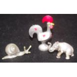 Three silver miniature animal figures