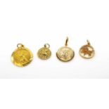 Four 9ct yellow gold pendants