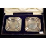 Cased pair sterling silver ashtrays