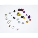 A quantity of loose gemstones