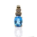 Topaz and diamond set 9ct yellow gold pendant