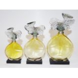 Three graduated Guerlain Parure perfume bottles