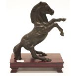 Chinese bronzed prancing horse figure