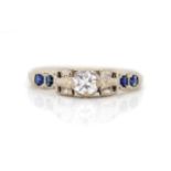 Diamond and sapphire set white gold ring