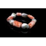 Coral and baroque pearl stretch bracelet