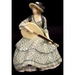 Austrian ceramic Seated Musician figure