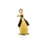 An enamel and 9ct rose gold penguin charm