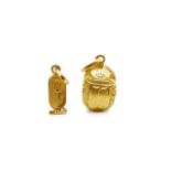 Two Egyptian yellow gold charms