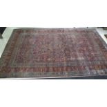 Large old Persian Mashad hand knotted wool rug