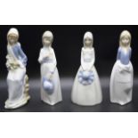 Lladro seated lady with lilies figurine