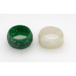 Two carved jade rings