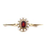 Garnet and pearl set 9ct yellow gold brooch