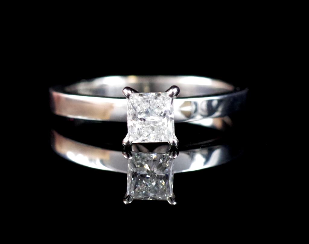 Princess cut diamond and 18ct white gold ring