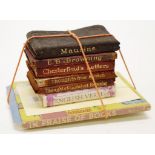 Seven various vintage miniature books