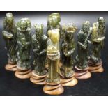 Eight Chinese green hard stone Immortal figures