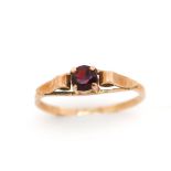 Garnet and rose gold ring