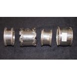 Four sterling silver napkin rings