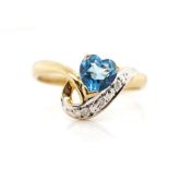 Blue gemstone and diamond set 9ct yellow gold ring