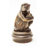 Vintage bone carving of monkey with young