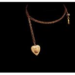 Antique gilt metal locket and long guard chain